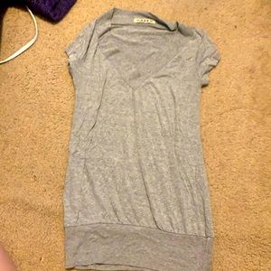 Gray shirt, runs long and tight